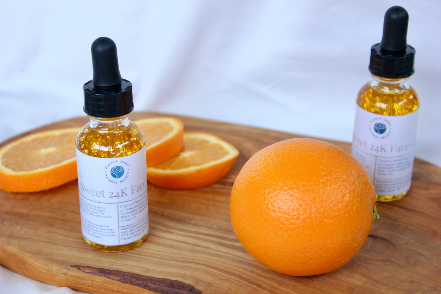 Sweet 24K Face Oil. Made with organic and natural ingredients and 24K GOLD flakes and sweet citrus scent. Flower Spirit Natural Beauty.