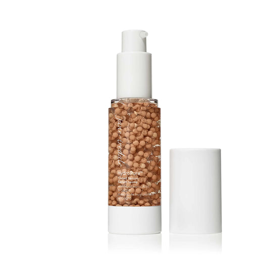Skincare bottle with a white cap and brown textured body on a white background